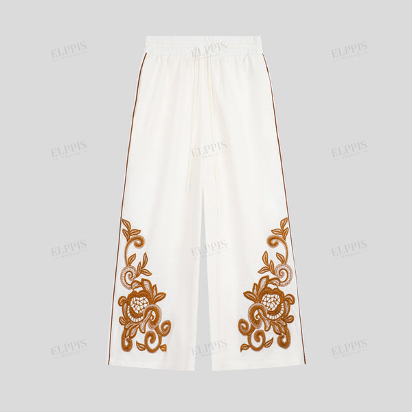 Cotton-linen color-blocked embroidered wide-leg trousers